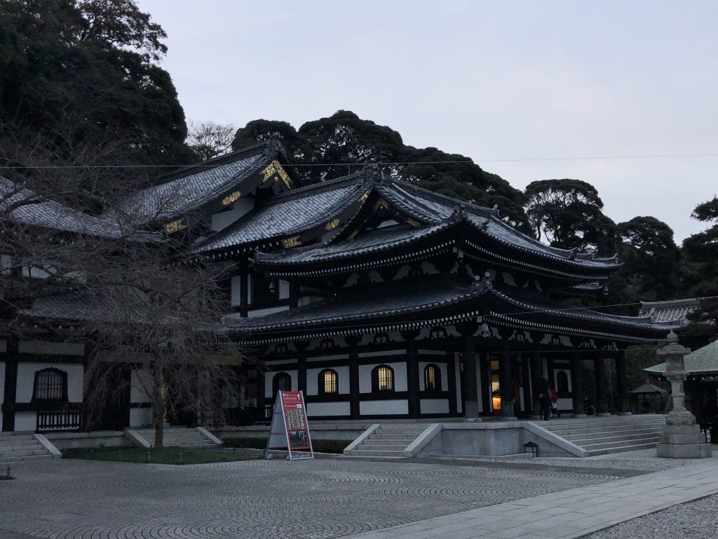 A traditional-style peaked roof building. It's very elaborate and beautiful.