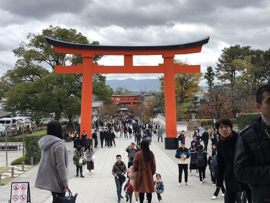 Two huge torii gates enclosing the path up to the shrine.